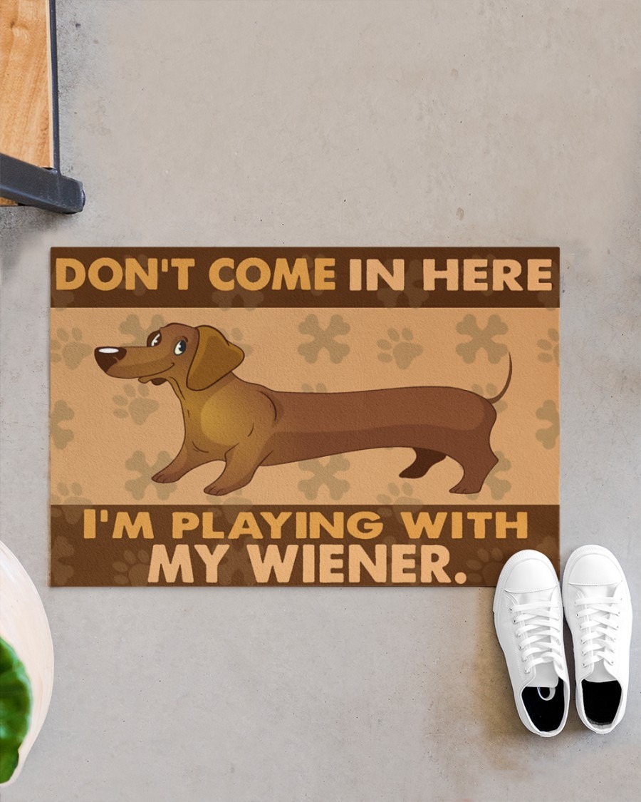 Dachshund dont come in here Im playing with my wiener doormat2